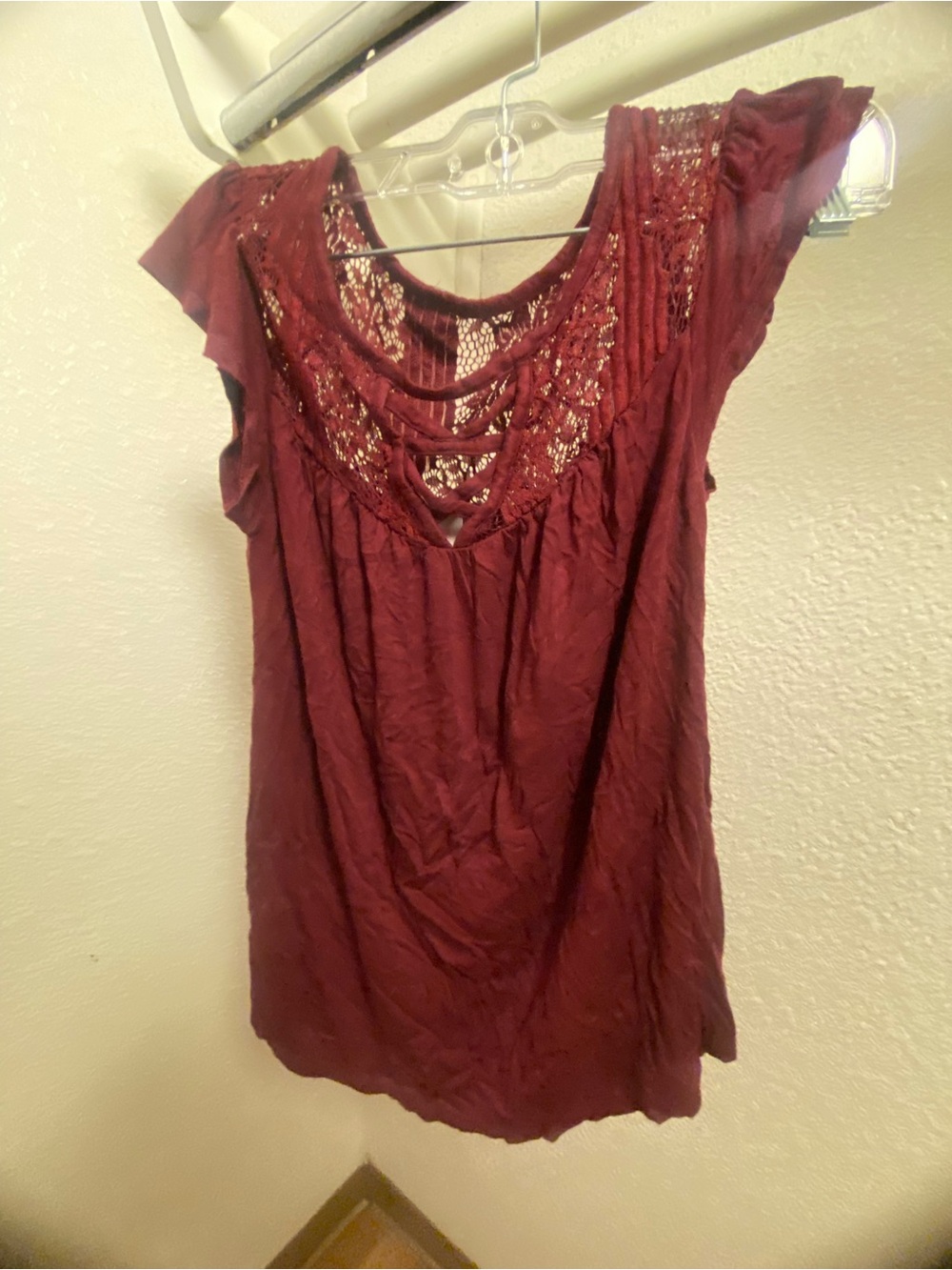 Burgundy lace blouse with ruffled neckline and short sleeves, woman’s size XS